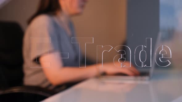 Woman Working in E-tradeDepartment