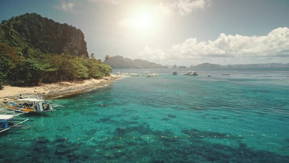 Aerial Sun Beach at Ocean Harbor with Boats on Azure Water