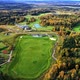 Aerial View of Golf Course Near the Forest - VideoHive Item for Sale