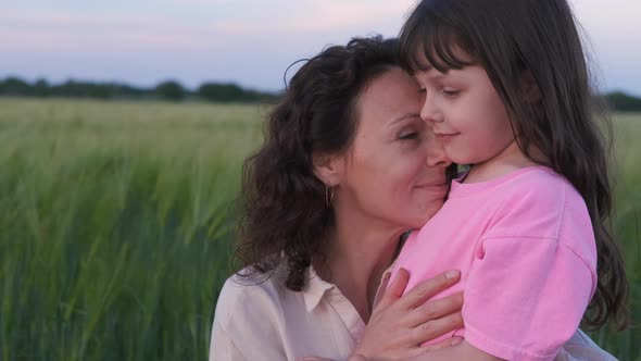 Portrait of a happy mother with daughter. 