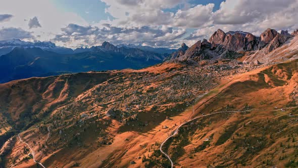 Passo Giau in Dolomites in autumn, Italy, aerial view