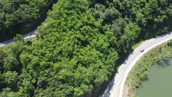 Steady flight over the lake and adjacent road