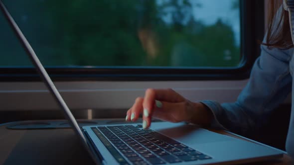 Using Laptop in Moving Train