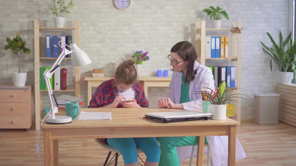 Doctor Psychologist Teaches an Autistic Child To Use a Smartphone