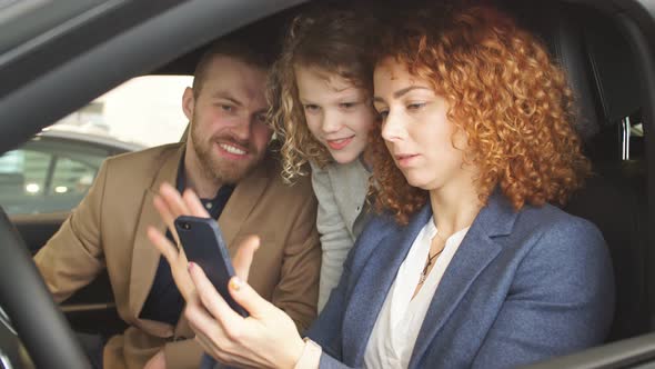 Beautiful Caucasian Family Try New Car From Inside