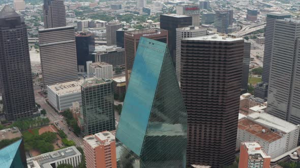 High Angle View of Sharp Ridge on Top of Tall Glass Covered Unusual Shape Building