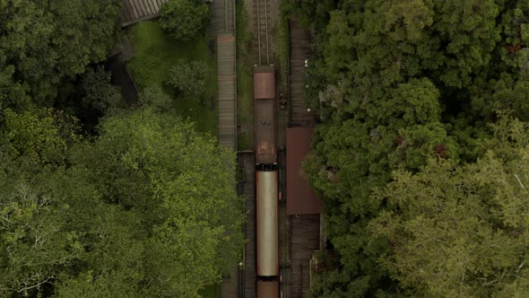 Zoom out the old train on the railways in Alishan - Aerial photography, top view.