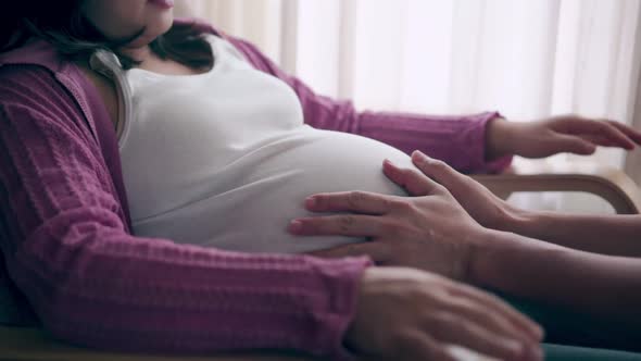 Pregnant Couple Feels Love and Relax at Home