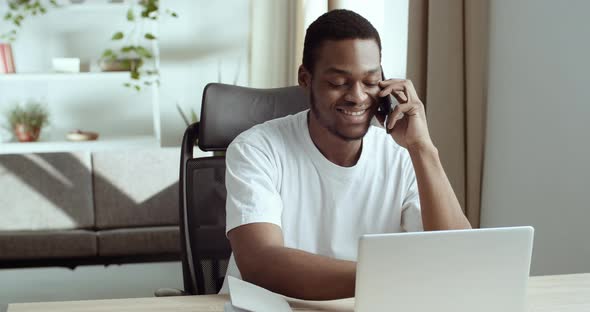 Portrait of Afro-american Male Student Guy Businessman Talking on Mobile Smart Phone with Client