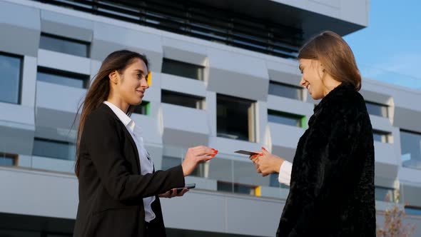 Meeting Of Two Young Businesswomen.