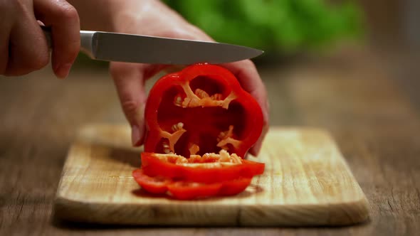 bell pepper. cooking process by the chef. salad ingredients. caring man preparing dinne