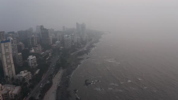 Drone shot along BJ road towards bandstand and Mumbai sealink on hazy day