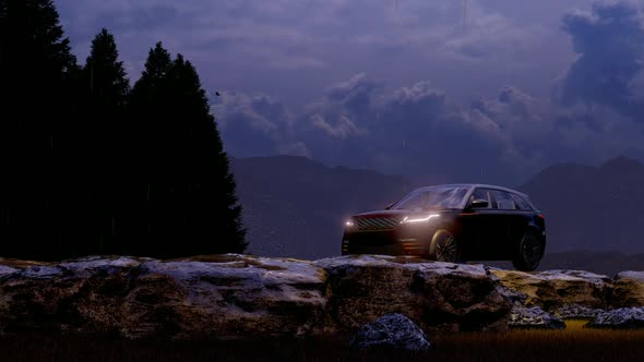 Black Luxury Land Vehicle Moving in the Rainy Mountain Area in the Evening