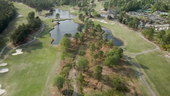 Aerial shot flying over scenic golf course