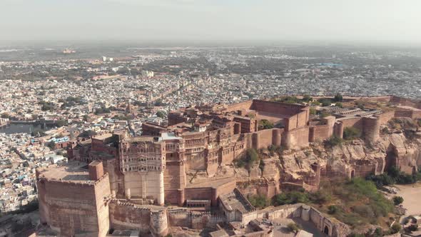Fly over Mehrangarh fort overseeing the city of Jodhpur, Rajasthan, India
