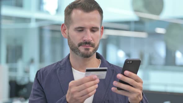 Middle Aged Businessman Having Online Payment Failure on Smartphone