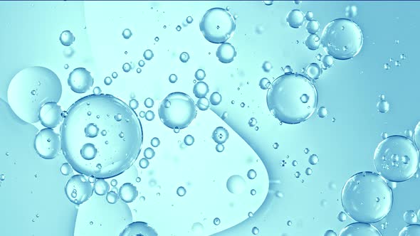 Super Slow Motion Shot of Moving Gel Bubbles on Light Blue Background at 1000Fps alt