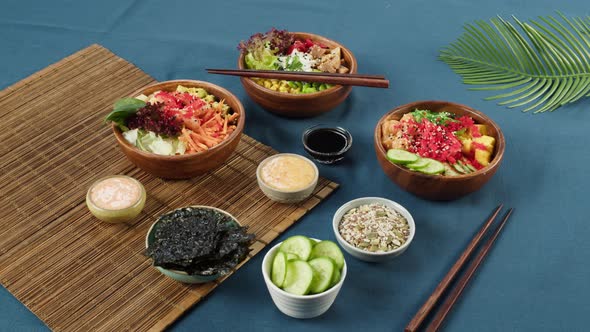 Cooked Poke Bowls Served with Sliced Vegetables Fish and Greenery Dried Seaweed