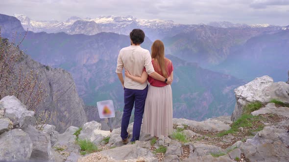Young Couple of a Man and Woman Visit the Grlo Sokolovo Famoust Canyon at the MontenegroAlbania