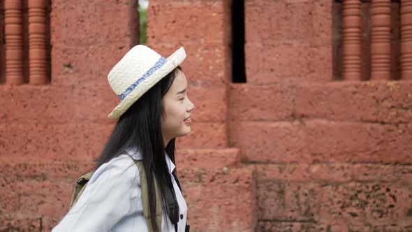 Woman visiting ancient temple