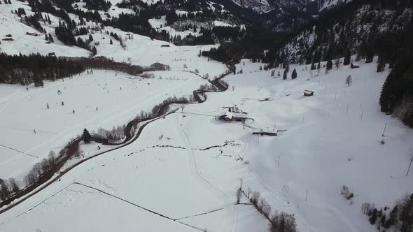 Aerial view of a small river in a valley 