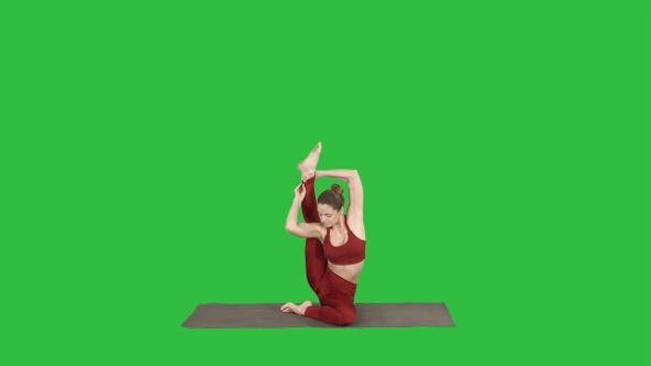 Sporty yogi girl doing fitness practice stretches, yoga