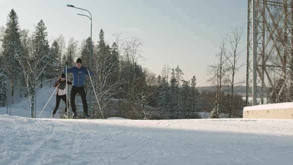 Two Athletes Cross-country Skiing