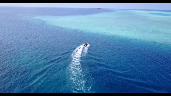 Aerial top view nature of marine shore beach trip by transparent ocean with white sand background of