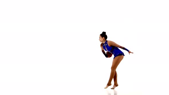 Young Beautiful Gymnast with Ball