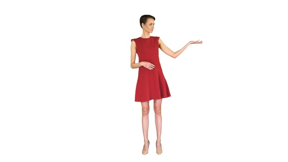 Model woman in red dress presenting something showing with