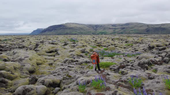 Drone Of Couple Taking Selfie In Mossy Landscape