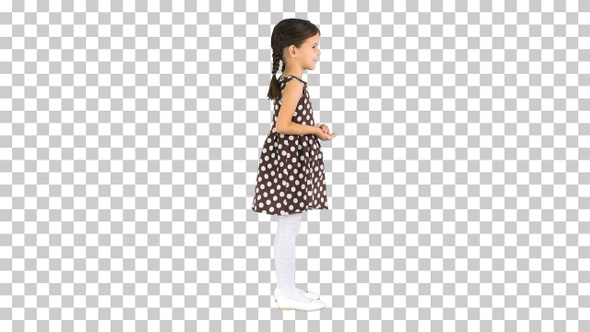 Cute little girl in polka dot dress clapping, Alpha Channel
