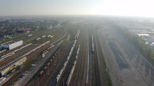 Aerial view. Modern high speed train. Railroad in landscape, aerial view from above. 