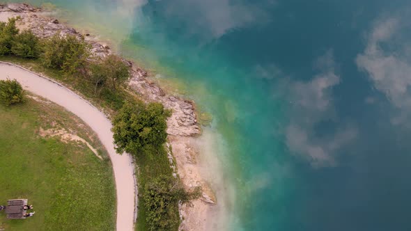 Aerial view on Ledro lake, Trentino, Italy. Drone goes up, shooting in 4k