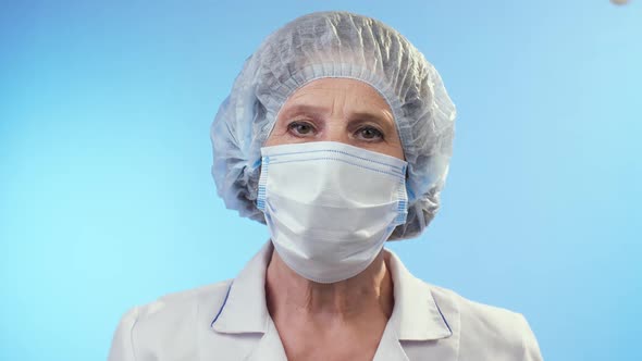 Portrait of Physician in Surgical Mask