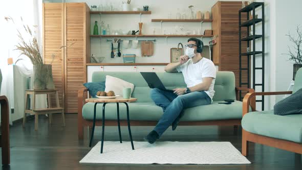 Male Worker Uses Laptop While Staying Home During Pandemic