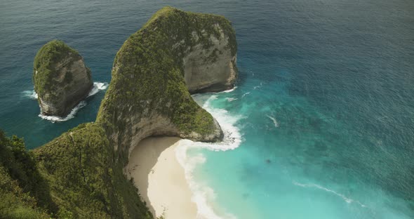 Static Slow Motion Shot of Waves Crashing on the Stunning Tropical Beach Kelingking Beach and TRex