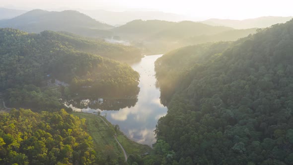 Aerial view, Morning view and dramatic sky over reservoir Pang Oung Lake.