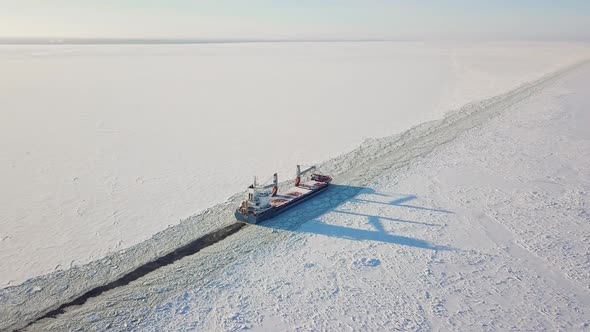 Cargo Ship in the Sea in Winter