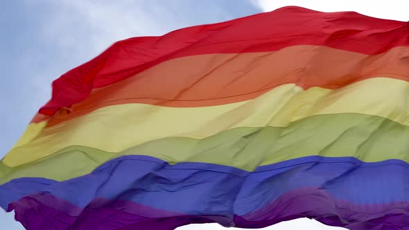 close up of the rainbow LGBT gay pride flag waving in the wind 4k