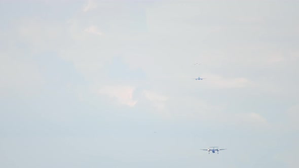 Airplanes Lined Up for Landing