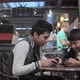 Two brothers with smartphones in cafe - VideoHive Item for Sale