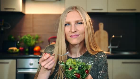 Glad Woman Eating Healthy Salad