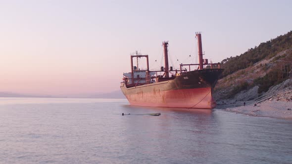 The Ship Ran Aground. Environmental Pollution at Sea. Aerial View. Grounded Ship. Drone Footage