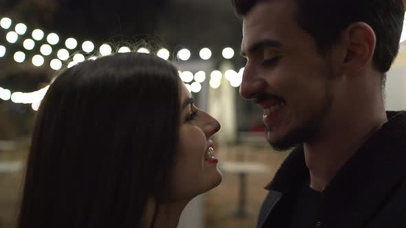 Close up view of a couple kissing alt