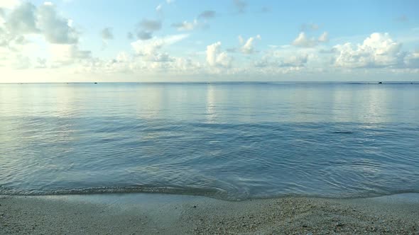 Beautiful tropical beach sea ocean with blue sky and white cloud