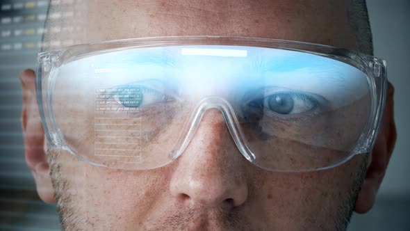 Close Up of Man in Smart Glasses with Coding 84