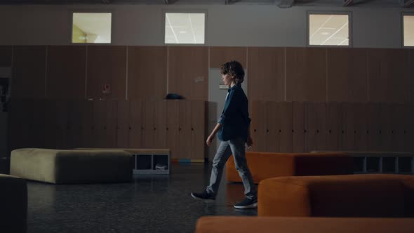 Pupil Boy Walking Empty Hallway Alone