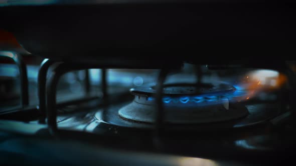Heating up the frying pan on the stove. Slow Motion. Unedited version included.
