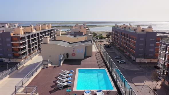 Aerial View of the Urban Area of Portugal in the South of Houses with Modern Infrastructure Swimming